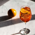 Leonardo Weinglas mit UV-Druck - Let the  good times Aperol mit Namen