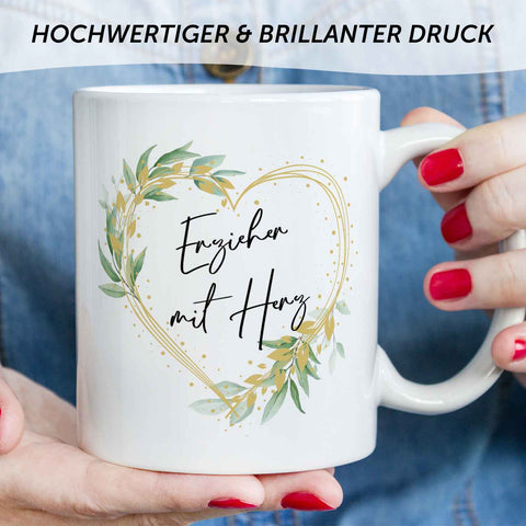 Bedruckte Tasse mit Spruch Erzieher/in mit Herz