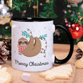 Bedruckte Tasse mit Weihnachtsmotiv im Merry Christmas Faultier Design